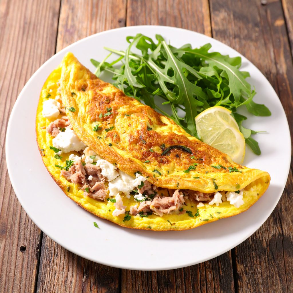 Omelette chèvre, thon, roquette